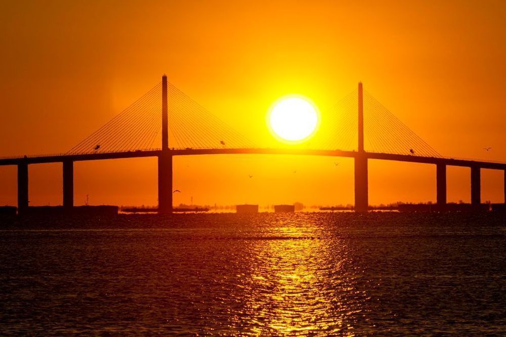 Sun Rising between the Skyway Bridge